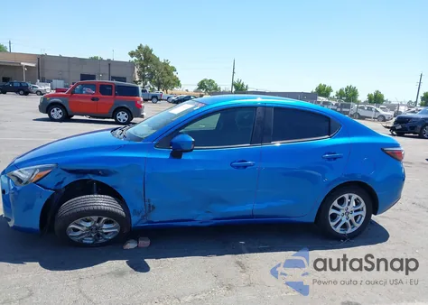 2018 Toyota Yaris Ia из США, поврежденный, VIN 3MYDLBYV7JY314998